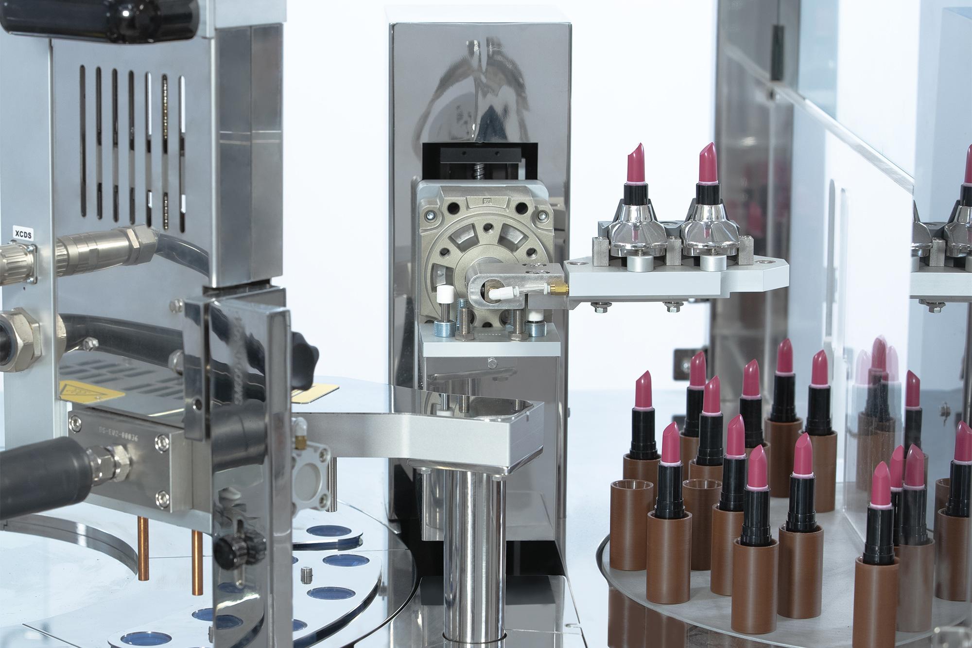 Detail of a lipstick machine